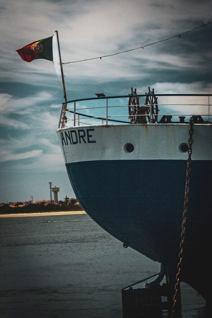 A large boat sitting on top of a body of water